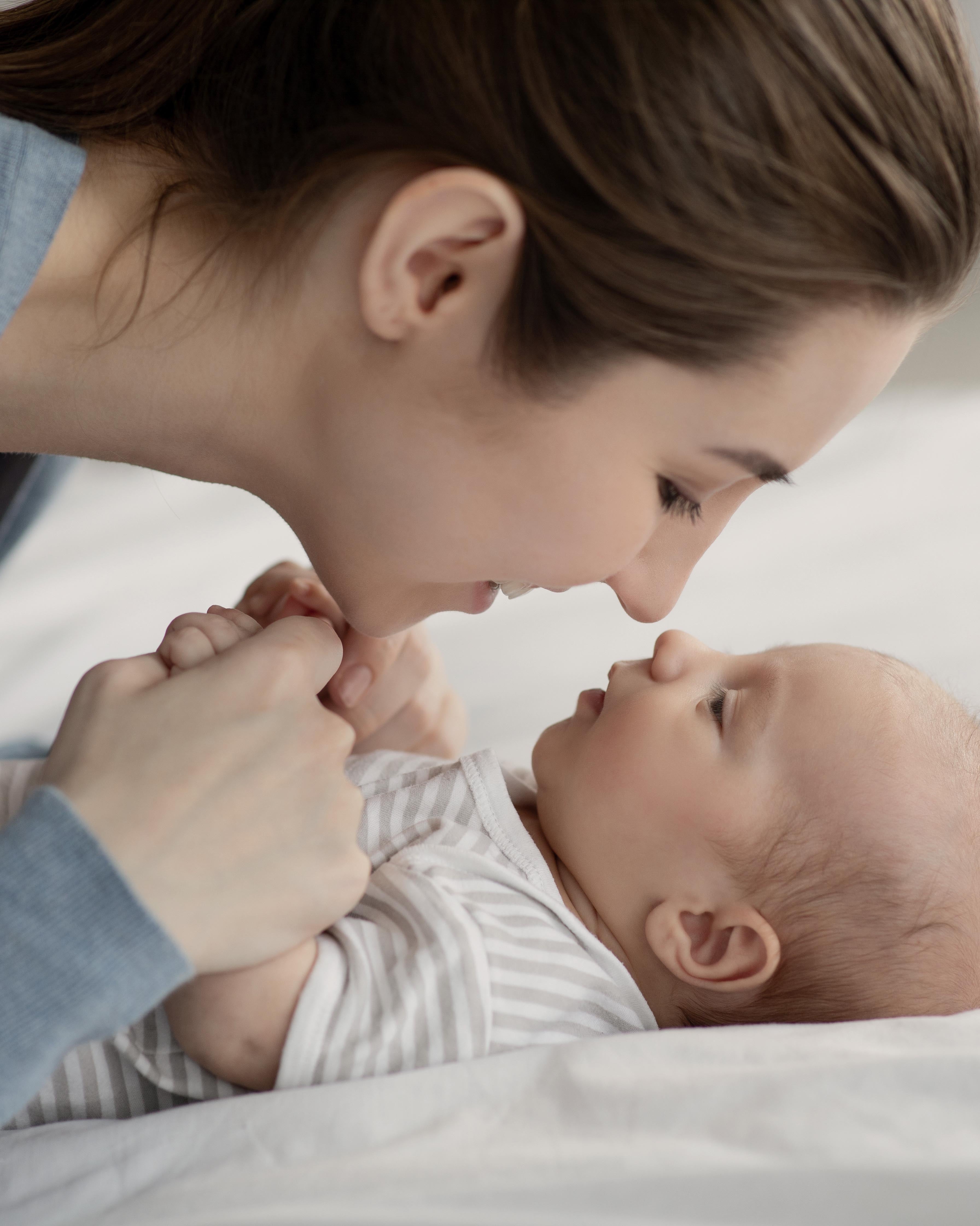 Happy mother bonding with her child
