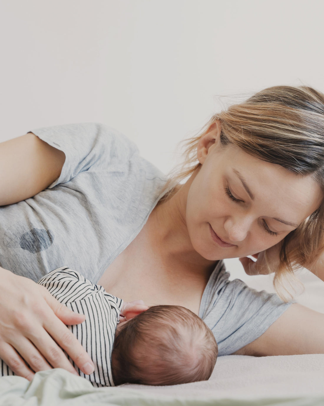 Mother breastfeeding her baby