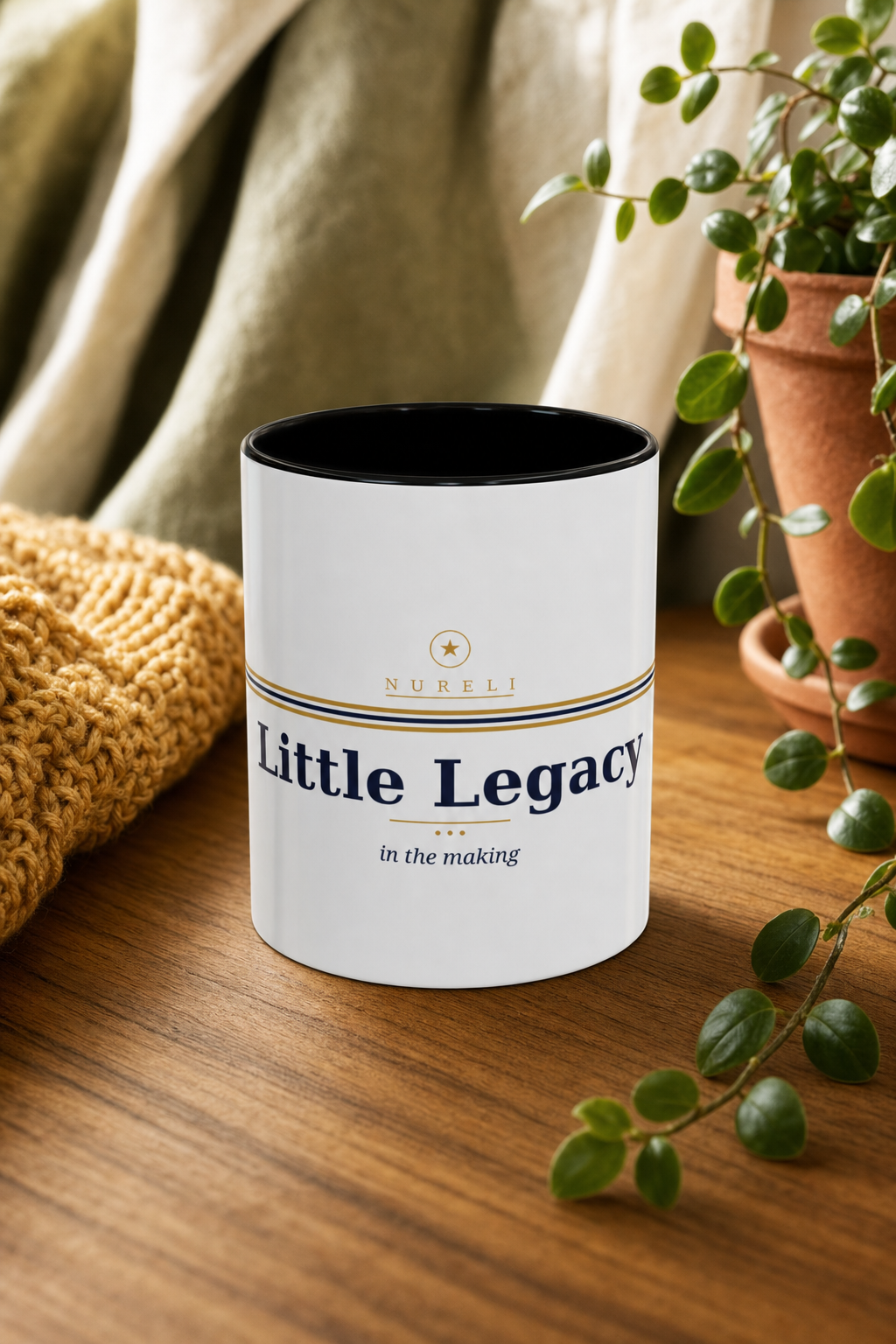 Little Legacy Coffee Mug by Nureli by Kala Library, ceramic mug styled on a warm oak table in soft morning light, premium lifestyle photo