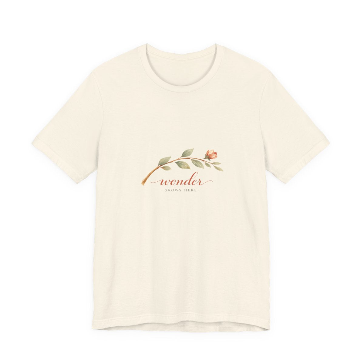 Wonder Grows Here tee front — soft cream